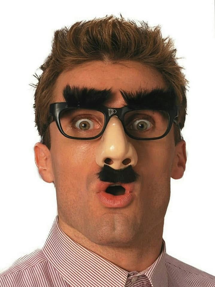 A man in a ridiculous disguise, representing a scammer trying to deceive people.