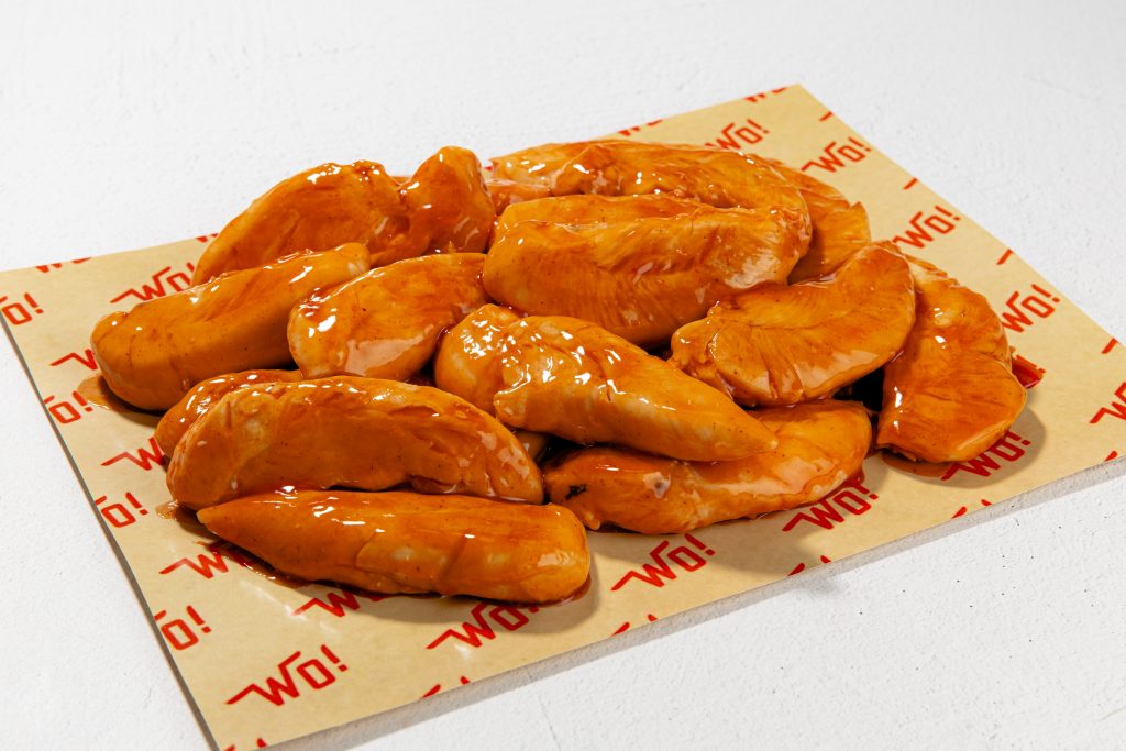 Juicy, perfectly grilled tenders with a golden-brown, sweet and tangy sauce, served hot and ready to enjoy.